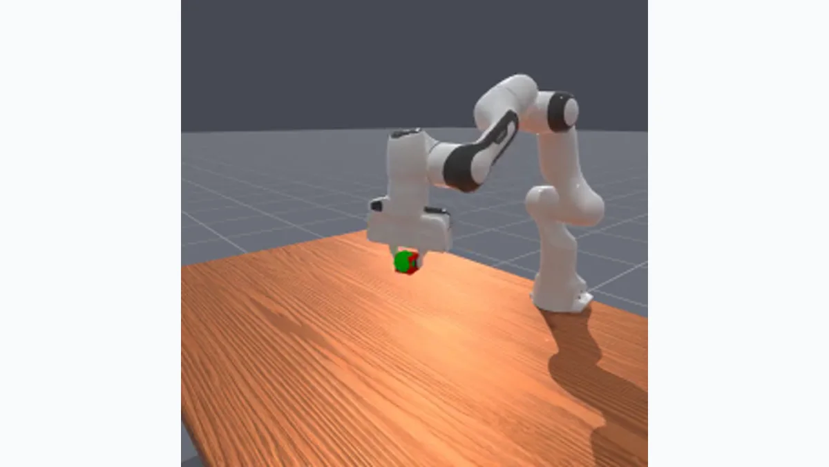 A ManiSkill simulation frame of a robot arm completing the PickCube task.