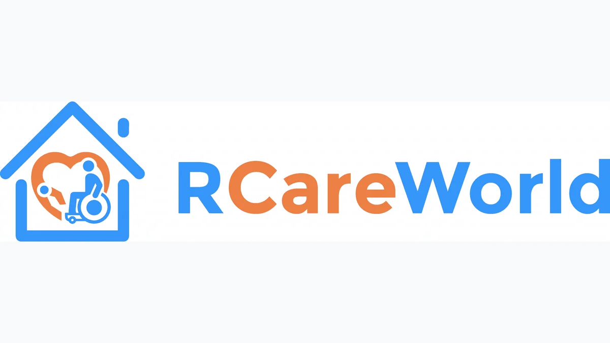 An RCareWorld simulation scene with a care robot in an indoor living environment.